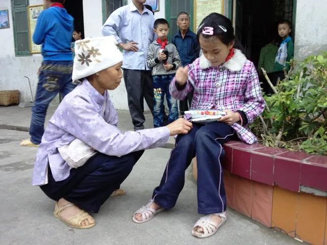 广西马秀灯同学和她的高老师