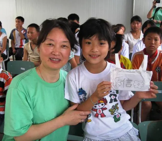 张成专稿---阳光种子五年访乐怡